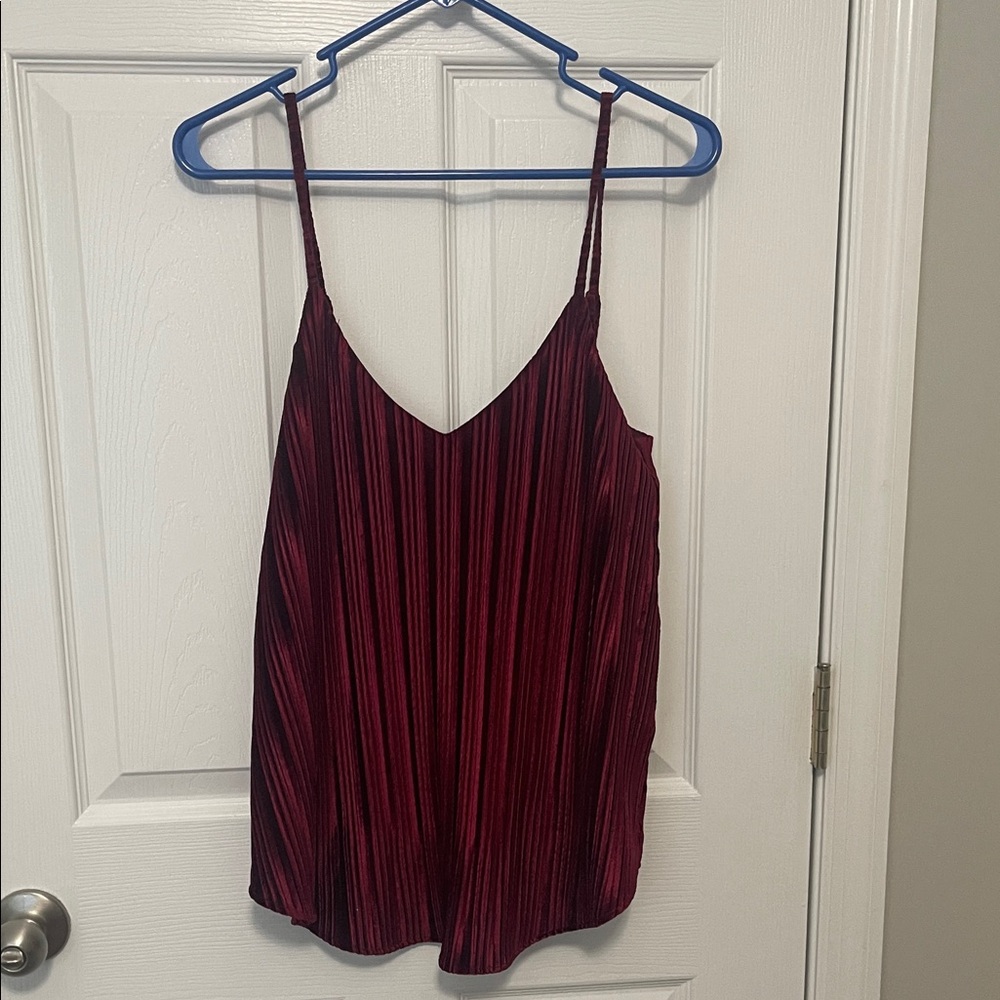 Woman’s red top.